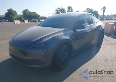 2023 Tesla Model Y Awd/Long Range Dual Motor All-Wheel Drive from USA, damaged, VIN 7SAYGAEE4PF609339